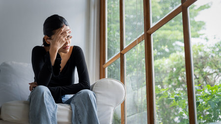 Depressed young Asian woman with mental health problem in mind need uttermost treatment from...
