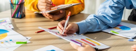 Startup company employee working together, analyzing BI dashboard paper on financial data report and planning strategic marketing for business success in panorama banner. Synergicの写真素材