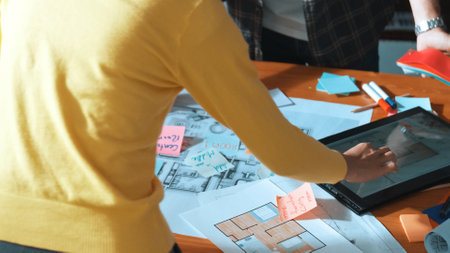 Top view of civil engineer writing and planning by using sticky notes to brainstorm idea. Top down...