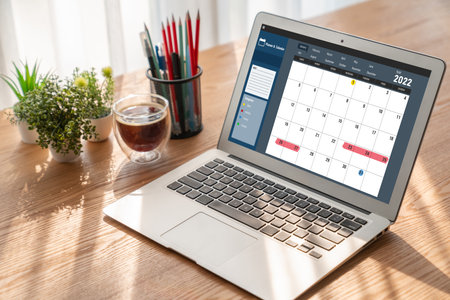 Calendar on computer software application for modish schedule planning for personal organizer and online businessの写真素材