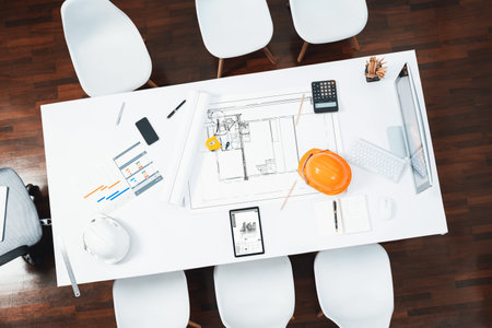 Top view empty workspace table for civil engineer and architectural construction development with paperwork and equipment for civil engineering background. Prudentの写真素材