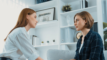 Supportive and comforting hands cheering up depressed patient person or stressed mind with prim empathy. Psychologist reassuring stressful and sad patient in clinic.の写真素材