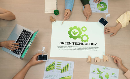Green technology illustration placed on a meeting table during a green business meeting discussion. ESG environment social governance and Eco conservative concept. Top view. Delineation.の写真素材