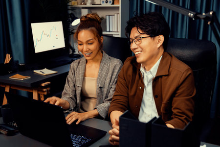 Managers discussing on document paperwork together for business planning on market share data at...