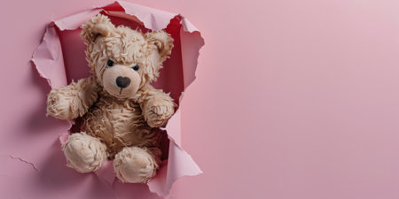 Close up view picture of the hollow pink hole on the the wall that show the teddy stay inside the wall that has been made from some material yet still can be break to look through other side. AIGX03.の素材