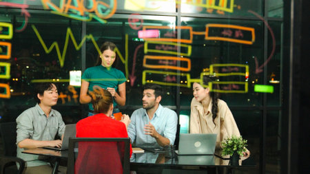 Skilled business team discussion about start up project at office. Group of businesspeople talking,...