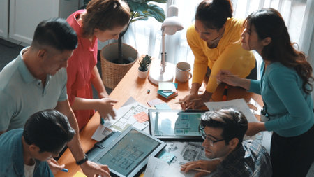 Time lapse of civil engineer team working together to plans building construction. Top view of architect designer walking and joining meeting while talking idea while looking at tablet. Symposium.の写真素材