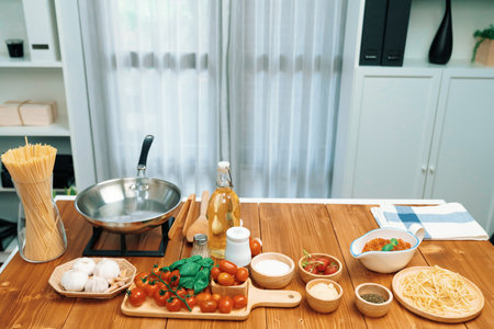 Presented on channel with delicious foods special menu homemade preparing station spaghetti with minced meat top tomato sauce and basil shooting placing elements serving with chef table. Postulate.の写真素材