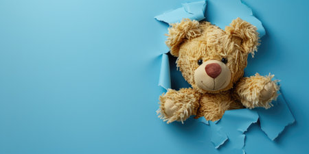 Close up view picture of the hollow blue hole on the the wall that show the teddy stay inside the wall that has been made from some material yet still can be break to look through other side. AIGX03.の素材