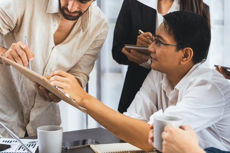 Data analysts team of office worker collaborate on business intelligence BI dashboard to analyze financial, trend, and marketing data. BI software utilization drive business success. Prudentの写真素材