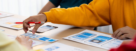 Panorama banner of startup company employee planning on user interface prototype for mobile...