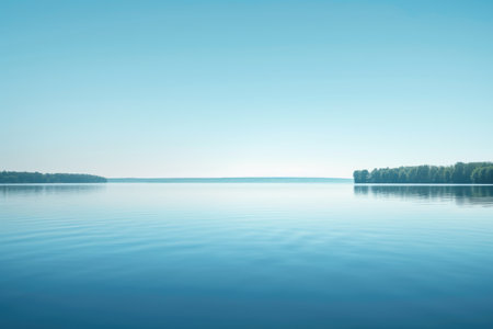 A minimalistic landscape photo view of river or ocean with blue sky. Horizontal landscape of realistic of beach with blue. Perfect ocean surface. Tranquility, calm concept. Nature concept. AIG42.の素材