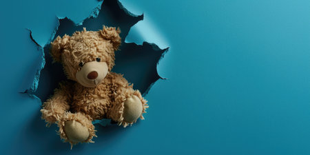 Close up view picture of the hollow blue hole on the the wall that show the teddy stay inside the wall that has been made from some material yet still can be break to look through other side. AIGX03.の素材