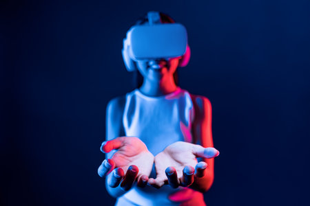 Smart Female standing surrounded by neon light wear VR headset connecting metaverse, futuristic cyberspace community technology, using both hands interact with generated virtual object. Hallucination.の写真素材