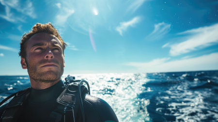 The picture of the diver is standing on the sea or ocean and wearing diving equipments, the diver require skills like knowledge of the diving equipment and gear, buoyancy control and training. AIG43.の素材