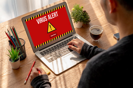Virus warning alert on computer screen detected modish cyber threat , hacker, computer virus and malwareの写真素材