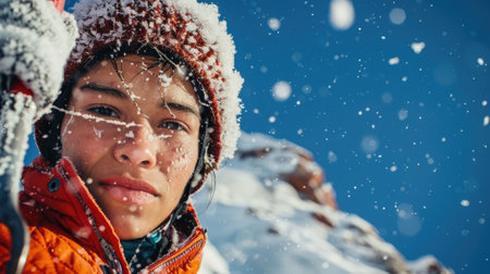 The picture of the ice climber is climbing the snowy ice mountain under the bright blue sky, the ice climbing require skills such as ice climbing technique, route finding and safety practices. AIG43.の素材