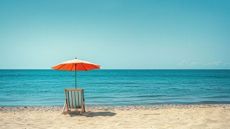 A chair and an umbrella provide shade on the sandy beach, with the azure sky reflecting in the crystal clear water of the oceanic coastal landforms AIG50の素材