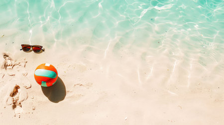 A beach ball and sunglasses are lying on the sandy shore, creating a colorful contrast against the landscape. Its a pictureperfect scene for leisure and recreation AIG50の素材