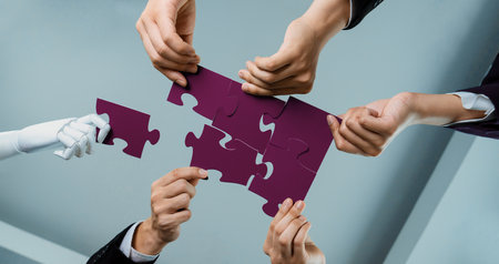 Futuristic HR recruitment with productive automation working in panoramic banner, as AI or artificial intelligence robotic workforce displace human. Robotic hand hold puzzle piece to fill gap. Shrewdの写真素材