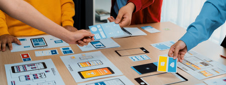 Panorama banner of startup company employee planning on user interface prototype for mobile...