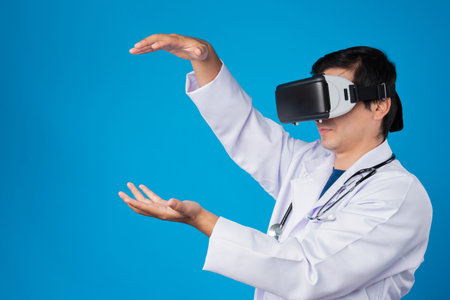 Smart doctor wearing VR headset connect metaverse touching screen with medicine research treatment futuristic tech hologram virtual reality intelligent world isolate blue background. Contrivance.の写真素材