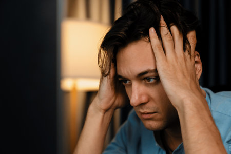 Thinking of stressful financial analyst researching on business paragraph on pc screen with dynamic...