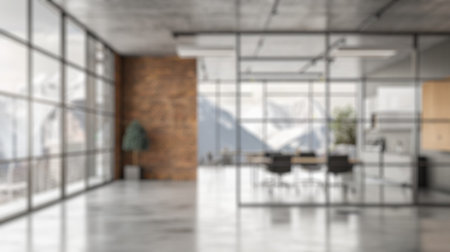 Blur background of blurred modern office interior with plant on desk. Workplace with plant decorated. Modern workplace and office decor concept. Design for poster, wallpapers, banner. Spate.の写真素材