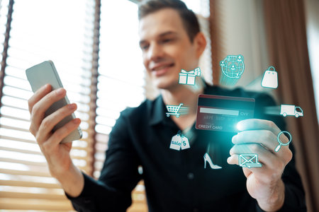 Elegant customer wear black shirt holding credit card choosing online platform. Smart consumer control device while open e-commerce application using cashless technology shopping inventory. Cybercash.の写真素材