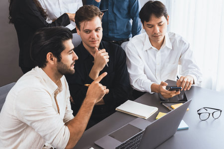 Group of diverse office worker employee working together on strategic business marketing planning in corporate office room. Positive teamwork in business workplace concept. Prudentの写真素材