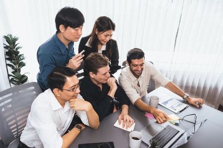 Group of diverse office worker employee working together on strategic business marketing planning in corporate office room. Positive teamwork in business workplace concept. Prudentの写真素材