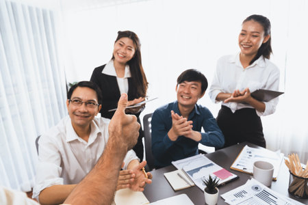 Data analysts team of office worker collaborate on business intelligence BI dashboard to analyze...