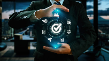 Business person enforces strict quality assurance protocols, ensuring QC and QA standards are met. Achieving certified product excellence through dedicated quality assurance. UUIDの写真素材