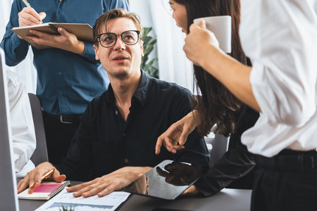 Group of diverse office worker employee working together on strategic business marketing planning in corporate office room. Positive teamwork in business workplace concept. Prudentの写真素材