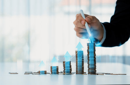 Coin stack with digital graphic indicator symbolizing business investment and economic growth....