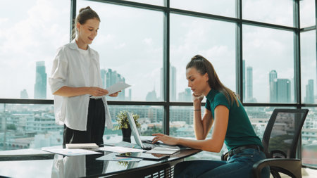 Smart businesswoman present start up project while executive manager listen carefully. Professional business team working together, sharing, discussing, thinking about business idea. Traceryの写真素材