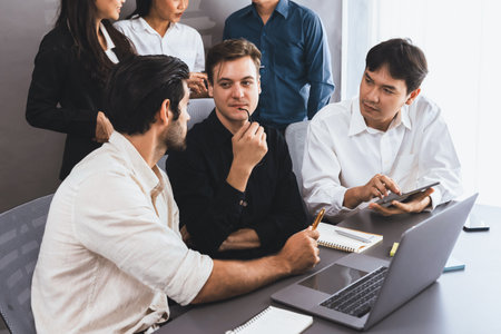 Group of diverse office worker employee working together on strategic business marketing planning in corporate office room. Positive teamwork in business workplace concept. Prudentの写真素材