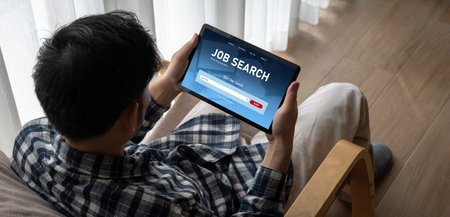Online job search on modish website for worker to search for job opportunities on the recruitment internet networkの写真素材