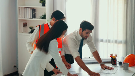 Top view of skilled business man and smart colleague design house together. Aerial view of architect engineer working and measuring building structure by using architectural equipment. Alimentation.の写真素材