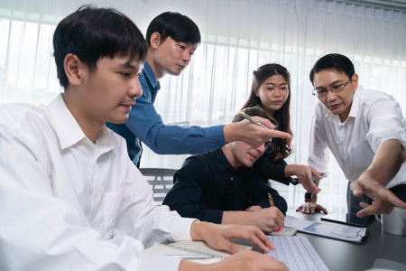 Group of diverse office worker employee working together on strategic business marketing planning in corporate office room. Positive teamwork in business workplace concept. Prudentの写真素材