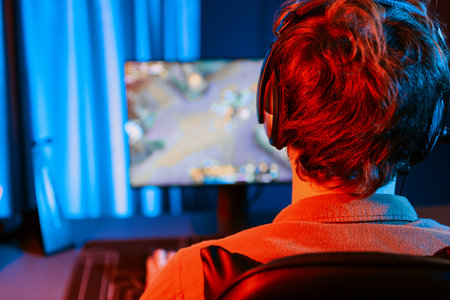 Host channel of young gaming streamer playing fighting Moba at battle arena game with multiplays...