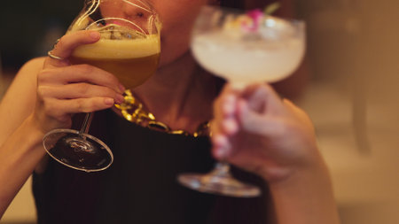 Enjoy drinking beautiful woman mixed vodka cocktails at luxurious counter bar toasting with friends...