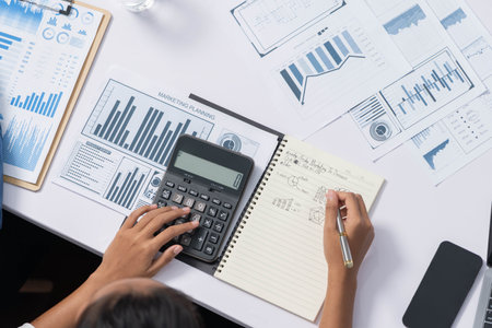 Diverse corporate audit team or company bookkeeper and accountant consultant calculate account...