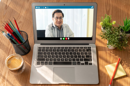 Doctor video call online by modish telemedicine software application for virtual meeting with patientの写真素材