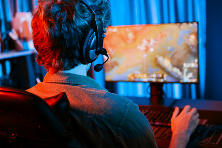 Host channel of young gaming streamer playing fighting Moba at battle arena game with multiplays...
