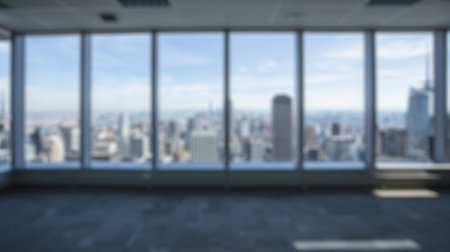 Blur background of architectural photography with a sky. Window view of skyscraper and blue sky...