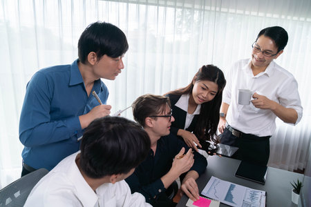 Group of diverse office worker employee working together on strategic business marketing planning in corporate office room. Positive teamwork in business workplace concept. Prudentの写真素材
