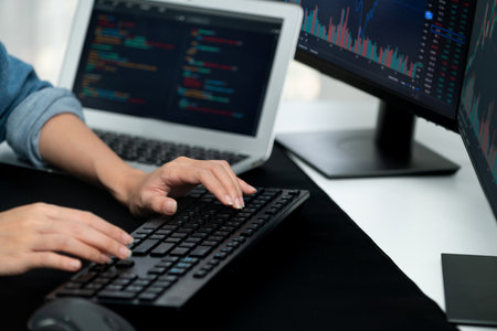 Cropped hands image of IT developer creating with typing information on pc with coding program...