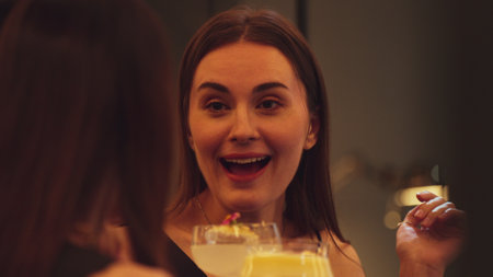 Enjoy drinking beautiful woman mixed vodka cocktails at luxurious counter bar toasting with friends...