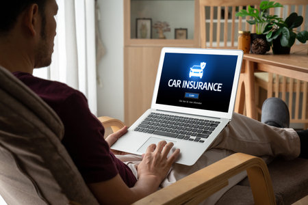 car insurance online website on computer screen for insure your car damage snuglyの写真素材